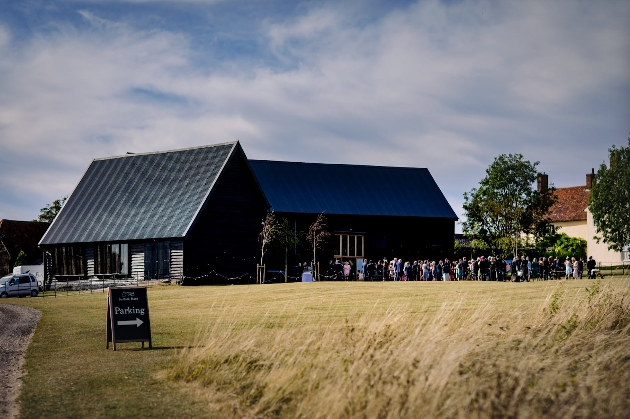 The exterior of a black barn