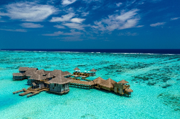 A beach hut floating on the water