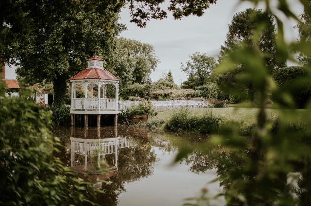 A gazebo situated above a lake